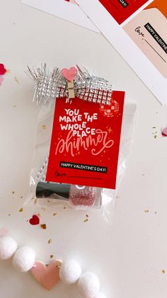 a package of valentine's day candies sitting on top of a white table