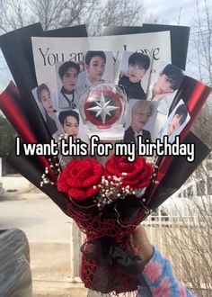 someone is holding up a bunch of flowers with the caption i want this for my birthday