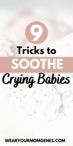 a baby laying on top of a bed with the title 9 tricks to soothe crying babies