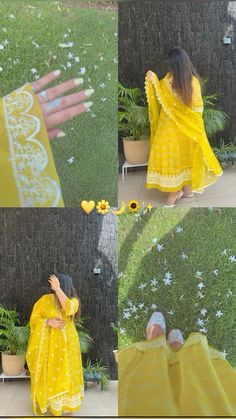 a woman in yellow dress sitting on the ground with her hand reaching for some flowers