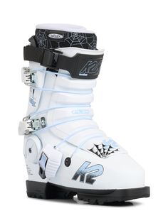 a pair of white ski boots with black and blue accents on the soles, side view