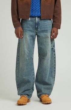 The Dark Indigo Tinted Dart Baggy Barrel Jeans from PacSun feature a rich dark indigo tint wash that elevates your denim game. Designed with a classic 5-pocket body, these jeans showcase darted knee details for added style and movement. The wide leg openings provide a comfortable fit, while the baggy design from the thigh through the knee and barrel-shaped legs ensure a laid-back look.Model is wearing a size 32Model Measurements: 6'2 Height, 30" Waist, 32" Inseam PacSun Mens Dark Indigo Tinted Dart Baggy Barrel Jeans - Blue size 30W 32L Thrift Manifest, Barrel Jeans, Pacsun Mens, Fits Inspo, Streetwear Men, Fall Fits, Dark Indigo