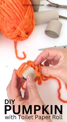 someone is crocheting an orange ball of yarn with the words, diy pumpkin with toilet paper roll