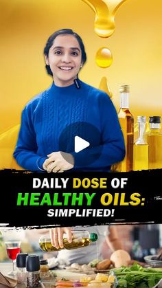 a woman in blue shirt cooking food on top of a table next to bottles of olive oil