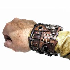 Large Brown Steampunk Leather Cuff Bracelet Steampunk | Etsy Lithuania Punk Leather Wrist Strap Jewelry, Punk Leather Jewelry With Wrist Strap, Punk Style Leather Jewelry With Wrist Strap, Punk Cuff Bracelets With Rivets, Punk Style Leather Cuff Bracelet, Brown Leather Punk Style Jewelry, Punk Style Brown Leather Jewelry, Punk Style Leather Cuff Bracelet With Wrist Strap, Gothic Leather Bracelet With Rivets