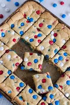 patriotic brownies cut into squares with red, white and blue sprinkles