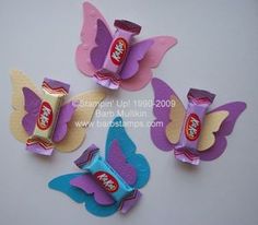 candy bar butterfly magnets with chocolate bars in the shape of butterflies on white background