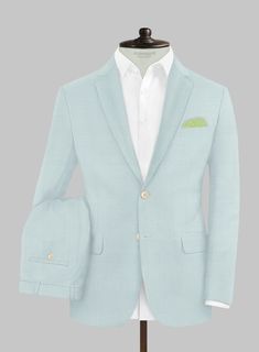 Infuse your style with confidence and poise in our Napoleon Pale Blue Wool Suit. Crafted with precision from a premium wool blend, this suit dazzles in a pale blue shade, showcasing a sleek solid pattern that defines luxury and comfort in every stitch. Perfectly suited for a range of events from joyous wedding celebrations to critical business meetings - this piece is designed to ensure you leave a lasting impact on any occasion.   Look Includes   Napolean Wool Baby Blue Fabric  Two Button Jacke Baby Blue Fabric, Grey Tweed Suit, White Linen Suit, Flannel Suit, Herringbone Jacket, Italian Suit, Beige Suits, Black Chinos