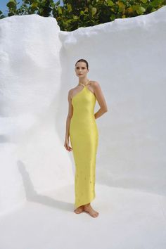 Introducing the "Palomino Dress" in Sunlight – this versatile one-shoulder maxi dress features spaghetti straps that can be worn on one side or both, allowing for customizable styling. The fitted silhouette is embellished with irregular beads, adding a touch of sparkle and uniqueness. The asymmetric hemline creates a dynamic and elegant flow, perfect for making a statement at any event. Tiny Tim, Bleecker Street, Sustainable Swimwear, Coral Reefs, Summer 24, Caribbean Sea, Fitted Silhouette, Skirt Pants, Dresses Xs