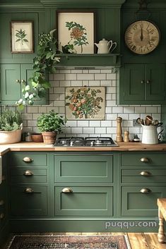 a kitchen with green cabinets and white tile backsplash, potted plants on the counter