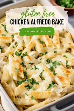 chicken alfredo bake in a white casserole dish with parsley on top