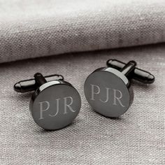 "Our sharp-looking Round Gunmetal Cufflinks are engraved with the receipt's initials and will look great on your groomsmen, best man, husband or father. We'll include a black gift box with each set to perfect your gift presentation! We also offer these in a set with a matching gunmetal tie clip: https://etsy.me/3juse4P - FREE SHIPPING on orders $35+ - FREE PERSONALIZATION - Measures 5/8\" (diameter) by 1\" in length. - Stainless steel construction with gunmetal coating - Traditional T-back closu Groomsmen Cufflinks, Groomsmen Gifts Unique, Groomsmen Gift Set, Engraved Cufflinks, Engraved Cuff, Custom Cufflinks, Groomsmen Gifts Personalized, Personalized Cufflinks, Groomsmen Gifts