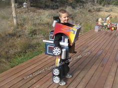 Homemade Optimus Prime Kids Costume: This is 8 year old Branson in his homemade Optimus Prime kids costume. We started printing all kinds of pictures of Optimus Prime. First we started with Old Costume, Homemade Costume, Costume Works, Boy Diy, Diy Halloween Costume, Homemade Costumes