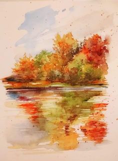 watercolor painting of an autumn scene with trees reflected in the water and clouds above