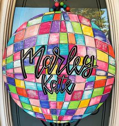 a colorful hot air balloon with the words marlies kate painted on it