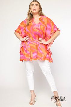 Our EDGY PLUS: Kati Ruffles Tunic is the perfect piece to take your look from basic to effortless chic! Our flowy poncho style top features an artful print in shades of orange and pink, giving you that girly but powerful look. With a self tie at the front neckline and ruffle sleeves, you'll attract attention everywhere you go! The lightweight woven fabric with a ruffle hem will keep you comfortable all day and night - no matter what your plans are. Make a statement with our EDGY PLUS: Kati Ruffl Flowy Orange Blouse For Vacation, Orange Ruffled Top For The Beach, Orange Ruffled Top For Beach, Orange Ruffled Tops For Vacation, Flowy Orange Top For Vacation, Oversized Pink Printed Tops, Oversized Printed Pink Tops, Trendy Flowy Pink Tops, Chic Beach Tops With Abstract Print