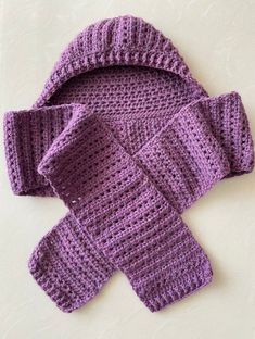 a purple knitted hat and scarf with the words, oh so easy hooded scarf