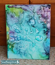 a painting with watercolors glue and salt easy looks cool, do on canvas, incorporated colors u want in ur room