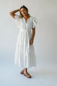 Get ready to turn heads in the Cresswell Eyelet Detail Dress! This stunning off-white dress features eyelet detailing and a figure-flattering silhouette, perfect for any occasion. With its playful design and unique features, this dress is sure to make a statement wherever you go. Be the talk of the town in the Cresswell Eyelet Detail Dress! Details self: 100% cotton lining: 100% rayon Fabric Care Guide Here Sizing & Fit Measurements are approximate and taken while laying flat across the front. N Elegant Eyelet Beach Dress, Fitted Eyelet Dress, Midi Length, Fitted Eyelet Dress Midi Length, Fitted Eyelet Midi Dress, Chic Fitted Broderie Anglaise Maxi Dress, Eyelet Dress For Day Out In Spring, Beach Eyelet Midi Dress, Beach Midi Eyelet Dress, Spring Eyelet Dress For Day Out