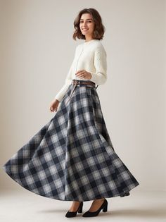 This winter wool skirt is a classic piece of tailoring that will see you through rain or shine. It is cut with a flattering flared skirt to give you a wonderful shape. The winter skirt is perfect classic styling and ends at the ankle. This is a versatile skirt that you'll wear again and again. DETAILS: * 30% wool, 30% fiber, 40% polyester * fully satiny liner * Two side pockets * Right zip closure * has belt loops to keep everything in place * back elastic band to provide some stretch * Plus size full skirt, warm thick winter skirt * Ankle length skirt * Perfect for Winter, autumn * Lean More about the items From the FAQs on the page bottom * The model is 170 cm (5′ 7″) tall with a 80 cm (31.5") bust, 66 cm (26") waist. She is wearing the wool plaid skirt in size XS. CUSTOM MADE SERVICE If Plaid A-line Skirt With Lining, Full Wool Skirt For Workwear, Wool Full Skirt For Work, Wool Full Skirt For Workwear, Elegant Plaid Winter Skirt, Classic Plaid Skirt For Fall, Wool Flared Maxi Skirt For Work, Plaid Relaxed Fit Skirt For Fall, Relaxed Plaid Skirt For Fall