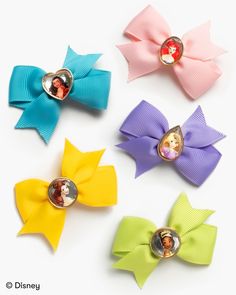 Every bow tells a tale! Includes five bow barrettes Features Disney Princess characters: Ariel, Belle, Moana, Rapunzel and Tiana Crafted with luxurious grosgrain ribbon This is an officially licensed Disney product Small parts, not intended for children under 3 years Disney Princess Ages, Princess Ages, Moana Hair Bow, Disney Ribbon Bows, Minnie Hair Bow, Disney Cheer Bows, Disney Princess Hair Bows, Mini Hair Bows, Disney Princess Characters