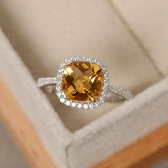 Citrine ring cushion cut yellow gemstone engagement ring White Gold Topaz Ring With Halo Setting, Cushion Cut, Cushion Cut White Gold Topaz Ring With Halo Setting, Yellow Citrine Cushion Cut Ring, Elegant Cushion Cut Citrine Jewelry, Yellow Cushion Cut Gemstone Ring, Formal Citrine Cushion Cut Ring, Formal Cushion Cut Citrine Ring, Elegant Yellow Square Cut Rings, Yellow Topaz Ring With Halo Setting For Wedding