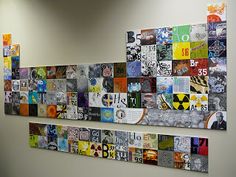 an art piece is displayed on the wall in front of a large number of pictures