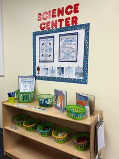 the science center is set up with books and toys for kids to read or play