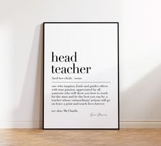 a black and white poster with the words head teacher on it in an empty room