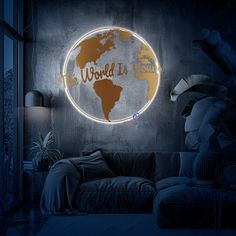 the world is yours neon sign in a dark room with a couch and lamp on it