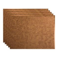 four brown leather placemats on a white background