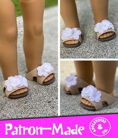 the doll is wearing sandals with flowers on them