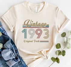 an old t - shirt that says vintage 1932 with the original paris number printed on it