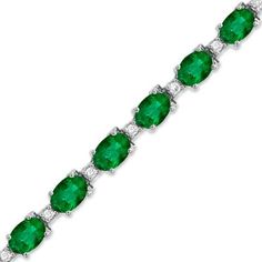 This emerald and diamond bracelet is available in 14K white gold. The centerstone may be special-ordered in any precious gemstone color. The oval emerald in this bracelet have a total carat weight of 9.50 carats. The diamonds have a total carat weight of 0.40 carats.~This style is handcrafted and requires 5 days for the jeweler to complete prior to shipping.~ Sparkly Bracelets, Diamond Tennis Bracelet, Sterling Bracelets, Stylish Bracelet, Local Jewelry, Expensive Jewelry, Pretty Bracelets, Tennis Bracelet Diamond, Emerald Jewelry