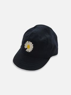 Flexible narrow brim cap featuring a daisy flower embroidering and strap back with a buckle. Made in South Korea Everyday Short Brim Baseball Cap For Spring, Spring Baseball Cap With Short Brim For Everyday, Everyday Spring Baseball Cap With Short Brim, Adjustable Black Baseball Cap For Spring, Black Adjustable Baseball Cap For Spring, A Daisy Flower, Black Caps, Caps And Hats, Black Cap