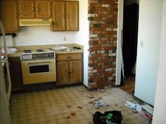 the kitchen is being remodeled with wood cabinets