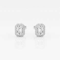 We can't keep these emerald stud earrings in stock. Styled with large emerald cut lab grown diamonds with a halo of round diamonds, these earrings are a true epitome of seductive glamor. Luxury Emerald Cut Lab Grown Diamond Earrings, White Emerald Cut Halo Jewelry, Formal Fine Jewelry Emerald Cut Diamond Earrings, Formal Emerald Cut Diamond Earrings, Formal Emerald-cut Diamond Earrings, Diamond White Emerald Cut Halo Jewelry, Classic Emerald Cut Earrings For Formal Occasions, Emerald Cut Lab Grown Diamond Jewelry With Halo Setting, Timeless Emerald Cut Diamond White Earrings