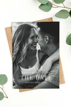 a save the date card with an image of a man and woman hugging each other