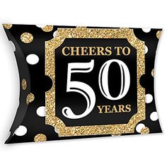 a black and gold 50th birthday pillow with white polka dots on the front that says cheers to 50 years