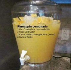 pineapple lemonade in a blender with instructions for how to make the drink