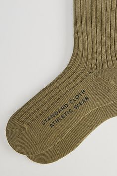 Simple knit trouser socks by Standard Cloth with a ribbed ankle cuff. Urban Outfitters exclusive. Features Standard Cloth trouser crew sock Ribbed knit socks Crew length UO exclusive Content + Care Includes 1 pair 85% Cotton, 13% polyester, 2% spandex Machine wash Imported Size Fits Men's shoe size 7-12 | Standard Cloth Trouser Crew Sock in Olive, Men's at Urban Outfitters Classic Cotton Socks For Winter, Cotton Socks With Ribbed Cuffs, Casual Fitted Socks With Ribbed Cuffs, Ribbed Cotton Mid-calf Socks, Classic Mid-calf Cotton Socks, Trouser Socks, Crew Sock, Men's Shoe, Ankle Cuffs