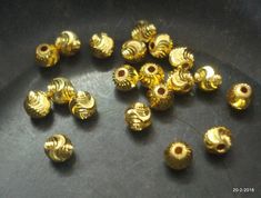 20kt gold beads (20 pieces) from rajasthan india. great design made of 20kt yellow gold, good for jewelry creation.Note - If you want more or less beads. It is possible.weight - 3.100 gramssize - 5 mmmaterial - 20kt yellow gold. Large Gold Beads For Festive Occasions, Gold Temple Jewelry Beads For Festive Occasions, Festive Large Gold Beads, Gold Large Beads For Jewelry Making, Large Gold Beads For Jewelry Making, Gold Faceted Beads For Temple Jewelry, Traditional Gold Beads For Jewelry Making, Gold Oval Polished Beads, Gold Spacer Beads For Festivals