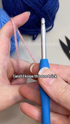 someone is knitting yarn with a blue crochet hook in front of them and the words i wish i knew this one trick