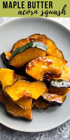 maple butter acorn squash on a white plate