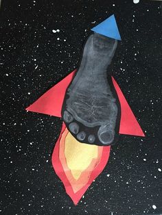 a painting of a hand on top of a rocket ship