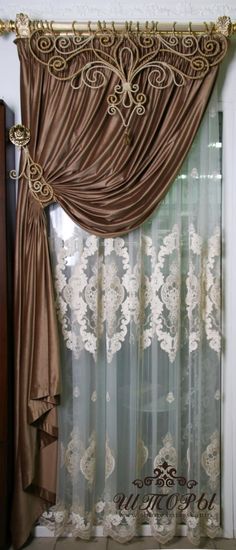 the curtains are open and ready to be hung in front of the window with lace on them