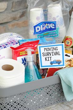 a basket filled with toilet paper and cleaning supplies