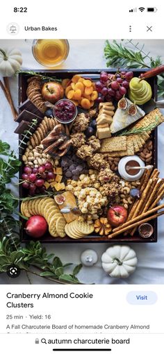 an image of a table full of different types of cookies and crackers on it