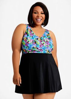 Look stunning and feel sleek in this Fit 4 U plus size swimdress. Intricate panels crisscrosses the front, bringing high fashion flair and flattering tummy control coverage to a tropical inspired swimsuit with comfortable, curve boosting support. Crisscross Tankini For Summer Vacation, Crisscross Summer Tankini For Vacation, Crisscross Tankini For Vacation In Summer, Summer Vacation Tankini With Crisscross Shape, Summer Vacation Crisscross Tankini, Summer Crisscross Tankini For Pool, Cute Tummy, Plus Size Trendy, Trendy Fits