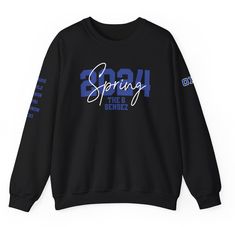 a black sweatshirt with the words spring in blue and white on it's sleeves